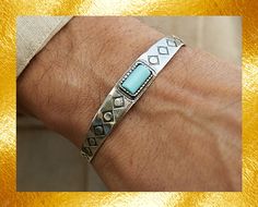 **NAVAJO TURQUOISE SILVER BRACELET** **Product Highlights** - Handcrafted Navajo-inspired silver bracelet adorned with natural turquoise. - Adjustable design ensures a perfect fit for all wrist sizes. - Made from high-quality 925 sterling silver for durability and elegance. **Key Features** - Authentic Navajo-inspired design. - Natural turquoise centerpiece adds a pop of color and charm. - Handcrafted with care in Córdoba, Spain. - Adjustable to fit various wrist sizes. - Lightweight and comfort Turquoise Centerpieces, Red Coral Jewellery, Turquoise Silver Bracelet, Western Bracelets, Navajo Bracelet, Native Design, Mens Bracelet Silver, Design Bracelet, Bracelet Mens