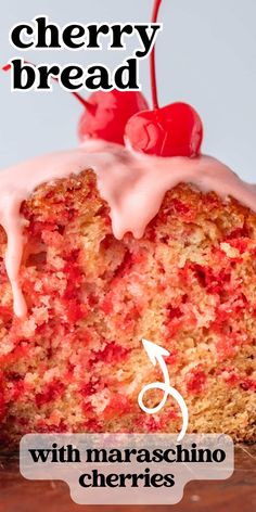 a close up of a piece of cake with icing and cherries on top