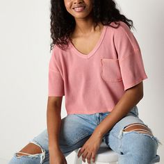 Keep your look casual and comfortable when wearing this cropped v-neck junior's and women's Arizona t-shirt. Cut for a boxy-fit, it's made from textured, stretch cotton-knit and has drop shoulders, a chest pocket, short sleeves. Pair this pullover tee with high-rise jeans and chunky boots.Closure Type: Pullover HeadFit: Boxy FitNeckline: Crew NeckPockets: 1 Chest Slip PocketSleeve Length: Short SleeveApparel Length: 18 InchesFiber Content: 58% Cotton, 39% Polyester, 3% SpandexFabric Description: T Shirt Cut, Arizona Jeans, Chunky Boots, Look Casual, High Rise Jeans, Cotton Knit, Chest Pocket, Stretch Cotton, Shirt Shop