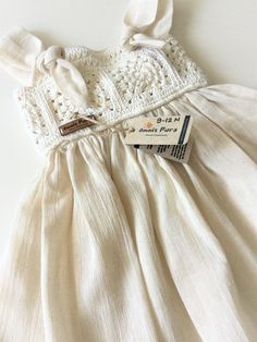 Cute Beach Dresses With Crochet Trim, Summer Cotton Crochet Lace Dresses, Summer Cotton Dresses With Crochet Lace, Cream Cotton Dress With Crochet Trim, Cute Cotton Crochet Dress For Summer, Cute Cotton Crochet Dress For Spring, Spring Cotton Dresses With Crochet Lace, White Cotton Crochet Dress, Sleeveless Cotton Dress With Crochet Lace