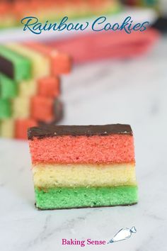 rainbow cookies with chocolate frosting on top