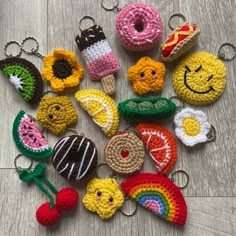 crocheted keychains with different types of fruit and vegetables are on the floor