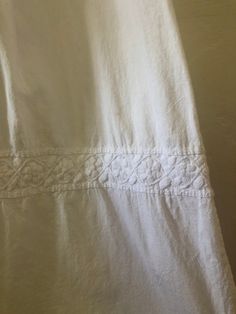 Vintage Mexican wedding dress. Thick cotton full length dress. Embroidered flower details at chest, hem, and sleeves. Size:  Up to women's L length 60" Pit to pit: free Waist up to 32" No tag In great vintage condition. White Cotton Maxi Dress With Broderie Anglaise, White Cotton Maxi Dress With Lace Trim, Cotton Maxi Dress With Broderie Anglaise For Daywear, Cotton Broderie Anglaise Maxi Dress, Fitted White Maxi Dress With Chikankari Embroidery, White Fitted Maxi Dress With Chikankari Embroidery, Cotton Broderie Anglaise Wedding Dress, Wedding Cotton Dresses With Broderie Anglaise, Broderie Anglaise Cotton Wedding Dress