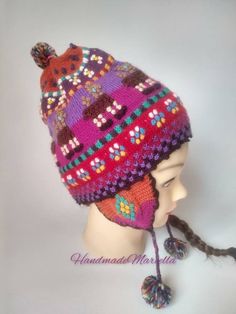 High relief hat. Beautiful Peruvian Andean hat with earflaps, ideal for wearing in the winter, colorful alpaca wool andean cap. Handmade in Ciudad de Cuzco by our artisans. Peruvian wool hat. Knitted hat, at the same time embroidered with beautiful colors, created a unique special, texture and effect.    Chullo with alpaca desing Peruvian hat. Composicion: 60% Alpaca - 40% Acrilico. Light weight. Chullo is an Andean style of hat with earflaps. Ready to send Thank you for visiting my store Peruvian Hat, Alpaca Coat, Wool Caps, Wool Winter, High Relief, Knitted Hat, Earmuffs, Alpaca Wool, Wool Hat