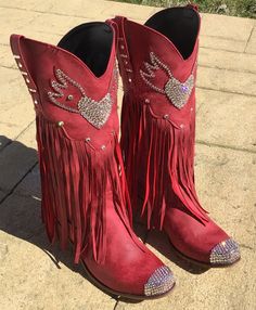 Ok, friends! Here we go1,000% authentic, genuine SWAROVSKI crystal rhinestone cowboy boots. These are not knock off stones, these are THE REAL DEAL! They are made with only the strongest adhesives and stones ranging in sizes from 3-6 mm for the brightest sparkle Soooooo fun! These boots are a gorgeous shade of deep crimson red, and are encrusted throughout with clear stones. These are man made material boots, yet still very nice quality. They have a really neat fringe flow curtain as well....I l Western Rhinestone Fringe Boots For Fall, Western Boots With Rhinestone Fringe For Fall, Western Snip Toe Boots With Rhinestones, Western Boots With Rhinestones And Snip Toe, Western Style Snip Toe Boots With Rhinestones, Western Rhinestone Boots With Round Toe, Rhinestone Boots With Round Toe For Rodeo, Western Boots With Bling And Round Toe, Western Boots With Rhinestones And Round Toe