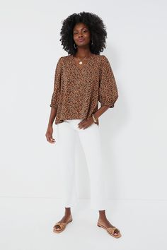 Leopard is back and we are obsessed with the Hollis Top! Featuring a playful print, V-neckline, and slightly puffed sleeves, this polished number is perfect for an elevated daytime look or for cocktail hour. We are pairing it with denim and sandals for an effortlessly chic throw-on-and-go look. V-neckline Three-quarter length sleeves Elastic cuffs Longer back Relaxed fit Material: 100% Polyester Care: Hand wash cold, hang to dry. Do not bleach, do not iron. Fall Palette, Easy Style, Plus And Minus, Wardrobe Style, Puffed Sleeves, Cocktail Hour, Pre Fall, Three Quarter, Capsule Wardrobe