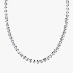 Experience luxurious elegance with our 14k solid gold East West Emerald Cut Tennis Necklace. Carefully selected and arranged, each lab-grown / lab created diamond creates a clean line, each diamond 0.08ct each. With a total of over 10 carats, this necklace will make a statement and become a staple in your jewelry collection. Perfect for any occasion, this necklace is a must-have for anyone who appreciates standout luxury and style. Product Details: Metal Type: 14K Gold, White Gold / Yellow Gold / Rose Gold  Emerald Cut Lab Grown Diamond: 3x2mm Total Diamond Weight: 10+ ctw (16 Inch) Diamond Clarity: VS Diamond Colour: F Comes in a Light Jewelry Box  Secure Clasp Luxury Diamond Jewelry, Necklace Emerald, Light Jewelry, Diamond Tennis Necklace, Tennis Chain, Emerald Cut Diamond, Vs Diamond, Tennis Necklace, Diamond Gold