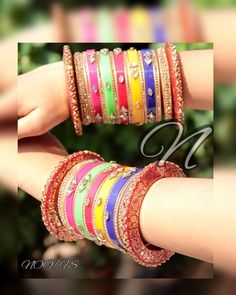 Get Ready To Reveal Your True Beauty In This Beautiful Multi Color Party Wear Chuda. The Combination Of Beautiful Colors Are Making This Ensemble Exclusive With Glass Kundan Beading On it. Foil Print Kangan At Both End Of This Chura Will Give You Charming Look. This is a set of 30 Bangles (15 Bangles For Each Hand). Multicolor Wedding Choli With Gota Work, Multicolor Lehenga For Puja And Festivals, Traditional Meenakari Dupatta For Party, Multicolor Choli For Wedding And Navratri, Multicolor Choli For Wedding During Navratri, Multicolor Cutdana Choli For Wedding, Bollywood Style Multicolor Wedding Sets, Bollywood Meenakari Dupatta For Party, Bollywood Style Meenakari Dupatta For Party