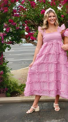 Introducing our Tinlee Flutter Ruffle Babydoll Midi Dress in pretty mauve pink. With flutter sleeves and tiered ruffle detail, this dress will make you feel like a flirty, fun and fab queen everywhere you go. Say yes to pink! Bradlee is wearing a size medium. Pink Tiered Ruffle Dress For Garden Party, Pink Flowy Tiered Dress, Pink Tiered Dress With Ruffle Hem, Spring Tiered Flutter Sleeve Dress With Ruffle Hem, Pink Flowy Tiered Dress With Ruffles, Spring Tiered Dress With Ruffle Hem And Flutter Sleeves, Flowy Pink Tiered Dress With Ruffles, Pink Midi Length Tiered Dress With Ruffle Hem, Pink Tiered Dress For Garden Party