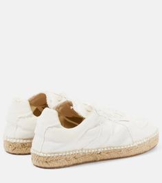 A combination of designs, these canvas sneakers from Maison Margiela are set on espadrille-style woven soles and have classic lace-up fastenings..Closure: lace-up.Lining: fabric.Sole: fabric insole, rubber sole.Toe shape: round toe.Trim: jute.Upper: fabric.comes with dust bags.comes with a box.Made in Spain.Fits large to size - we recommend trying one size smaller.European sizes.2cm-1' platform (size EU 38) Cream Lace-up Sneakers For Summer, Textile Lace-up Canvas Shoes With Contrast Sole, Beige Cotton Canvas Shoes With Vulcanized Sole, Textile Canvas Shoes With Contrast Sole, Beige Cotton Sneakers With Round Toe, Casual Textile Sneakers With Woven Sole, Casual Linen Espadrilles With Round Toe, Beige Cotton Canvas Shoes With Rubber Sole, Beige Canvas Shoes With Rubber Sole