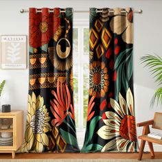 the curtains are decorated with colorful flowers and leaves on black, red, yellow, green, orange