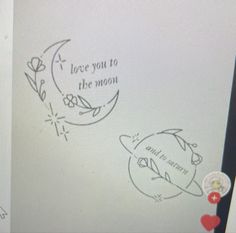 the back side of a computer screen with writing on it and an image of a crescent moon