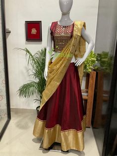 This Lehenga is made of pure soft silk fabric. The outfit is lined with satin.You can choose cotton or satin for lining. The outfit consist of crop top, skirt and dupatta.The top is heavily embroidered with mirrors and beads.A golden boarder is given at the hem edge of the skirt.Dupatta edges finished with a maroon beading.The colours can be customise according to your requirements.The outfit is a made to order dress. I will send a measurement sheet once you place the order. Bollywood Cotton Silk Choli For Reception, Reception Anarkali Cotton Silk Set, Festive Cotton Silk Lehenga For Reception, Cotton Silk Lehenga For Diwali Reception, Cotton Silk Lehenga For Reception And Diwali, Designer Resham Embroidered Cotton Silk Lehenga, Semi-stitched Cotton Silk Choli For Reception, Floor-length Cotton Silk Lehenga With Resham Embroidery, Traditional Cotton Silk Sets For Reception