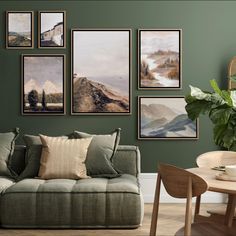 a living room with green walls and pictures on the wall above it, including a couch