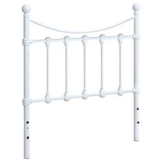 a white headboard with four posts and two knobs