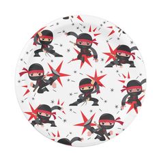 a paper plate with ninjas on it and stars in the background, all over