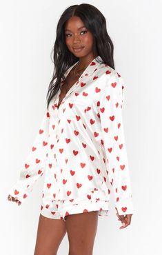 Love in is the air with our favorite pj set! You will want to wake up every morning in this silky soft outfit! We paired drawstring waist shorts with a long sleeve button up blouse in our Queen of Hearts print! Heart Print Long Sleeve Pajama Party Sets, Heart Print Long Sleeve Sleepwear For Pajama Party, Printed Pajama Shorts For Pajama Party, Chic Long Sleeve Sleepwear For Pajama Party, Chic Long Sleeve Sleep Sets, Printed Pajama Shorts For Loungewear, How Many Bridesmaids, Drawstring Waist Shorts, Girls Together