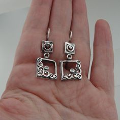 New beautiful long Earrings in square shape. These earrings are made of textured filigree 925 sterling silver with sparkling white CZ. These sterling silver decorated earrings will always make your look very chic. Labeled and stamped 925. This beauty will be sent to you with a modern recycled brown gift box. (All stains, if are any, are due to camera) Material: Sterling Silver 925 Gemstone: Sparkling White CZ Dimensions: Length: 35mm / 1.377 inch Width: 14 mm / 0.551 inch Labeled and stamped 925 Modern Rectangular Wedding Earrings, Elegant Rectangular Sterling Silver Earrings, Silver Square Cut Earrings For Formal Occasion, Silver Square Cut Earrings For Formal Wear, Silver Square Cut Earrings For Anniversary, Sterling Silver Rectangular Earrings For Wedding, Sterling Silver Wedding Earrings With Rectangular Shape, Square Pendant Earrings For Gift, Silver Square Cut Earrings For Gift