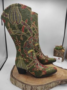 Custom Made Cowboy Style Tulip Pattern Knee High Women Boots #CowboyBoots #CountryStyle #GiftForHer #OutdoorFit #WesternBoots #HandmadeBoots #FestivalBoots #CustomMade #SuzaniBoots #KneeHighBoots Traditional Leather Sole Boots For Fall, Traditional Fall Boots With Leather Sole, Bohemian Winter Boots With Snip Toe, Bohemian Snip Toe Winter Boots, Handmade Traditional Snip Toe Boots, Bohemian Winter Snip Toe Boots, Handmade Brown Ankle Boots, Handmade Western Boots For Fall, Vintage Handmade Boots With Round Toe