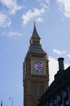 the big ben clock tower towering over the city of london