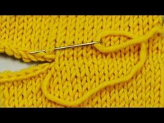 the knitting stitch is being worked on