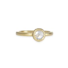 This ring features a rosecut diamond set in a clean, minimalist bezel setting. The side profile reveals all the surprise details of a hidden halo of pavé diamonds and an exposed base of the diamond. 14k yellow gold Diamond 2mm wide band Size 6.75, can be ordered in additional sizes. Rebecca Overmann, Rosecut Diamond Ring, Hidden Halo, Side Profile, Diamond Set, Rose Cut Diamond, Hudson Valley, Wide Bands, Designer Jewelry