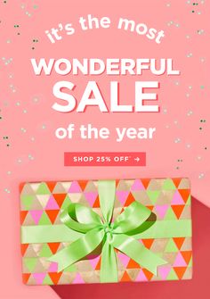 a pink and green present box with the words it's the most wonderful sale of the year