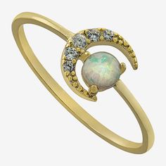 Adding this Silver Treasures 14K gold over silver opal moon ring to your jewelry collection, you are adding sophistication. This ring is crafted in 14K gold over silver and features a simulated opal stone along with Cubic Zirconia stones. With the delicate and sparkling design, this ring can be worn with any wardrobe choices. This ring can be worn alone or with other favorites from your jewelry collection. Wipe ring clean with a soft cloth.Ring Style: Delicate Rings, Stackable Rings, BandsFeatur Adjustable Gold Opal Ring Fine Jewelry, Gold Opal Birthstone Ring, Gold Opal Ring With Birthstone, Gold Celestial Opal Promise Ring, Celestial 14k Gold Opal Gemstone Ring, Moon Shaped 14k Gold Ring, Gold Moon Shaped 14k Gold Ring, Gold Moon-shaped 14k Gold Ring, Gold Celestial Moonstone Ring With Moon Phase