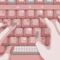 two hands typing on a pink keyboard with hearts and flowers in the letters above it