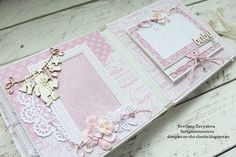 a pink and white handmade card with flowers on the front, an embellishment in the back