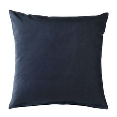 a dark blue pillow on a white background