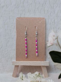 These barbie pink bead stacks are a dream! Despite what you may think, they are dainty and lay perfectly along the jaw/neckline. You'll have fun twirling the beads all day while people compliment how beautiful your earrings are! Stack Earrings, Stacked Earrings, Earrings Handmade Dangle, Earrings Pink, Pink Beads, Pink Earrings, Dainty Earrings, Last Minute Gifts, Earrings Jewelry