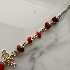 This handmade necklace is wrapped with gold plated wire, featuring bamboo coral. 14" length. All orders include freebie crystals and stickers. Handmade Red Coral Gold Jewelry, Handmade Gold Necklace With Red Coral, Bamboo Coral, Handmade Necklaces, Coral, Gold Plate, Plating, Crystals, Gold