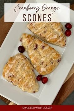 cranberry orange scones on a white plate with text overlay that reads, cranberry orange scones