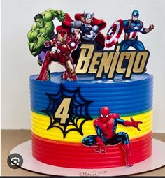 a birthday cake decorated with the avengers and spiderman characters