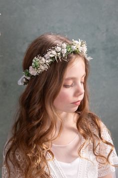 Romantic flower hair wreath in white and green tones, perfect for first holy communion, weddings or other special occasions and celebrations.  This hair wreath is made of artificial flowers and preserved material. Elegant headpiece handcrafted with love. We also offer other headbands, floral belts, bracelets, head wreaths or candle decoration for first holy communion.  Dress: Svadobný salón Ľubica Photo: Michaela durisova photography Model: Jasmínka, Thalia When stored in dry and dark place, our White And Green Hair, Floral Belts, White Floral Headpiece, Elegant Headpiece, Flower Crown White, Roses Crown, Communion Headpiece, Communion Hairstyles, Bridesmaid Headpiece