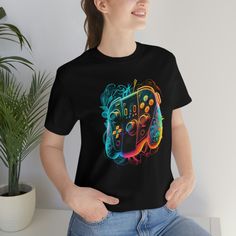 Are you ready to step up your style game with a unique and eye-catching t-shirt? Look no further than our Colorful Neon Line Art Tee! This shirt is the perfect choice for anyone who loves his hobbies and passions like gaming, nature, animals, and art. Crafted from high-quality materials, our t-shirts are both comfortable and durable, ensuring that you look and feel great no matter where you go. The unique neon line art design features a bold and colorful object or creature, sure to make a statement and turn heads wherever you go. Our t-shirts are perfect for a wide range of occasions, from casual outings to music festivals and more. The unisex design is versatile and stylish, suitable for both men and women, and the black color adds a touch of sophistication to any outfit. And with our com Gamer Style Graphic Print Short Sleeve Shirt, Gamer Graphic Cotton Top, Gamer Cotton Tops With Graphic Design, Gamer Cotton Top With Graphic Design, Graphic Print T-shirt For Gaming Events, Black Graphic Print Tops For Gaming Events, Graphic Print Short Sleeve Tops For Gaming Events, Casual Short Sleeve T-shirt For Gaming Events, Black Gamer T-shirt With Graphic Print