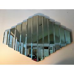 a large mirror hanging on the wall