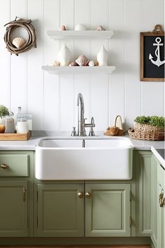 Elevate your kitchen's style with these 10 budget-friendly coastal decor ideas that'll have you feeling like you're on vacation. Coastal Backsplash, Japanese Inspired Bedroom, Kitchen Decor Hacks, Coast House, Coastal Kitchen Decor, Decor Hacks, Kitchen Paint Colors, Coastal Kitchen, Shell Decor