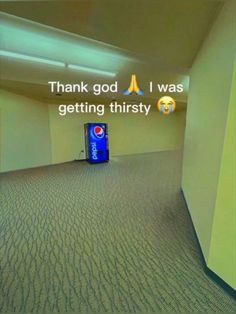 an empty room with a pepsi can in the middle and a thank god i was getting thirsty sign on the wall