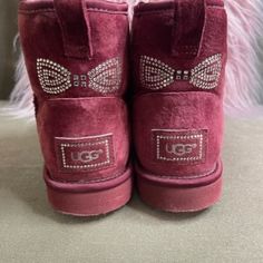 Short Mini Classic In Burgundy Suede With Crystal Bows And Logo. Crystals Are All In Tact ( See Photos). There Is Still Lots Of Thick Fur Inside. The Ugg's Were Not Worn Much. Very Clean And In Excellent Condition! No Stains, Nor Smells, Smoke Free Home. No Box Included. Mcbling Shoes, Mcbling Clothing, 2010 Accessories, Country Jeans, Cute Uggs, Y2k Boots, Pretty Sneakers, Kawaii Shoes, Ugg Classic Mini