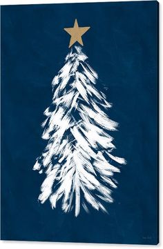 a white christmas tree with a gold star on it's top and blue background