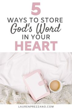 a cup of coffee and notebook on top of a bed with the words 5 ways to store god's word in your heart