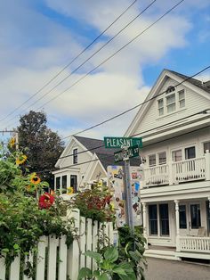 a street sign in front of some houses