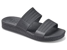 Reef Water Vista Slide - Women's Shoes : Black : Enjoy sunset beach walks wearing the waterproof Reef Water Vista Slide slip-on style sandal. Synthetic upper construction. TPU lining. Soft, bouncy, and dual-density lightweight compression molded EVA footbed. Slip-on style. Classic two-strap slide. Round toe silhouette. Rubber and plastic outsole. Imported. Black Waterproof Slides For The Beach, Black Waterproof Slides For Outdoor, Black Waterproof Slides For Summer, Waterproof Beach Slides, Waterproof Synthetic Slides For Vacation, Comfortable Beach Slides Waterproof, Comfortable Waterproof Beach Slides, Comfortable Waterproof Slides For Beach, Black Slip-resistant Slides For Vacation