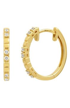 Handcrafted from 18-karat gold and embellished with prong-set diamonds, these hoop earrings are designed to enhance your glow. 5/8" hoop diameter Total diamond weight: 0.09ct. Color: G Clarity: VS 18k gold/diamond Imported >Diamond Guide Diamond Huggie Earrings With Halo Design, Gold Small Hoop Diamond Earrings With Prong Setting, Luxury Channel Set Hoop Huggie Earrings, Gold Hoop Diamond Earrings With Halo Design, Small Hoop Yellow Gold Cubic Zirconia Earrings, Yellow Gold Hoop Diamond Earrings With Prong Setting, 14k Gold Pave Hoop Earrings, 14k Gold Hoop Earrings With Pave Setting, Small Diamond Hoop Earrings With Halo Design