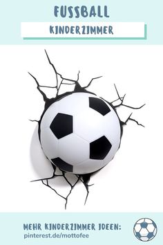 a soccer ball is breaking through the wall