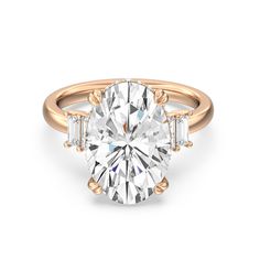 https://embed.imajize.com/6363232 Oval Diamond With Emerald Side Stones, Oval And Emerald Engagement Ring, Baguette Side Stones, Oval Solitaire Engagement Ring, Ring Inspo, Oval Diamond Ring, Side Stone Engagement Ring, Oval Engagement, Cushion Ring