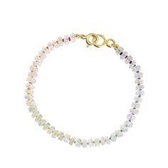 FACETED RAINBOW MOONSTONE - RAINBOW SILK™ Vibrant rainbow silk™ adds a magical layer of vivid color to this gleaming strand of faceted rainbow moonstone rondelles. The perfect companion to your favorite arm candy. Total length 7.25" Available with 18KT yellow gold vermeil or 14KT solid yellow gold closure Genuine faceted rainbow moonstone rondelles measure approximately 5-5.5mm Each rainbow silk ™ piece is a true one of a kind - slight natural color and size variance will occur Customization ava Elegant Rainbow Bracelets With Round Beads, Elegant Rainbow Round Beads Bracelet, Elegant Rainbow Faceted Jewelry, Elegant Rainbow Beaded Bracelets, Rainbow Rondelle Beaded Jewelry, Multicolor Faceted Rondelle Bracelets, Elegant Rainbow Jewelry With Faceted Beads, Rainbow Hand-strung Round Jewelry, Rainbow Round Jewelry With Faceted Beads