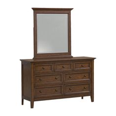 a dresser with a mirror on top of it and drawers under the bottom drawer,